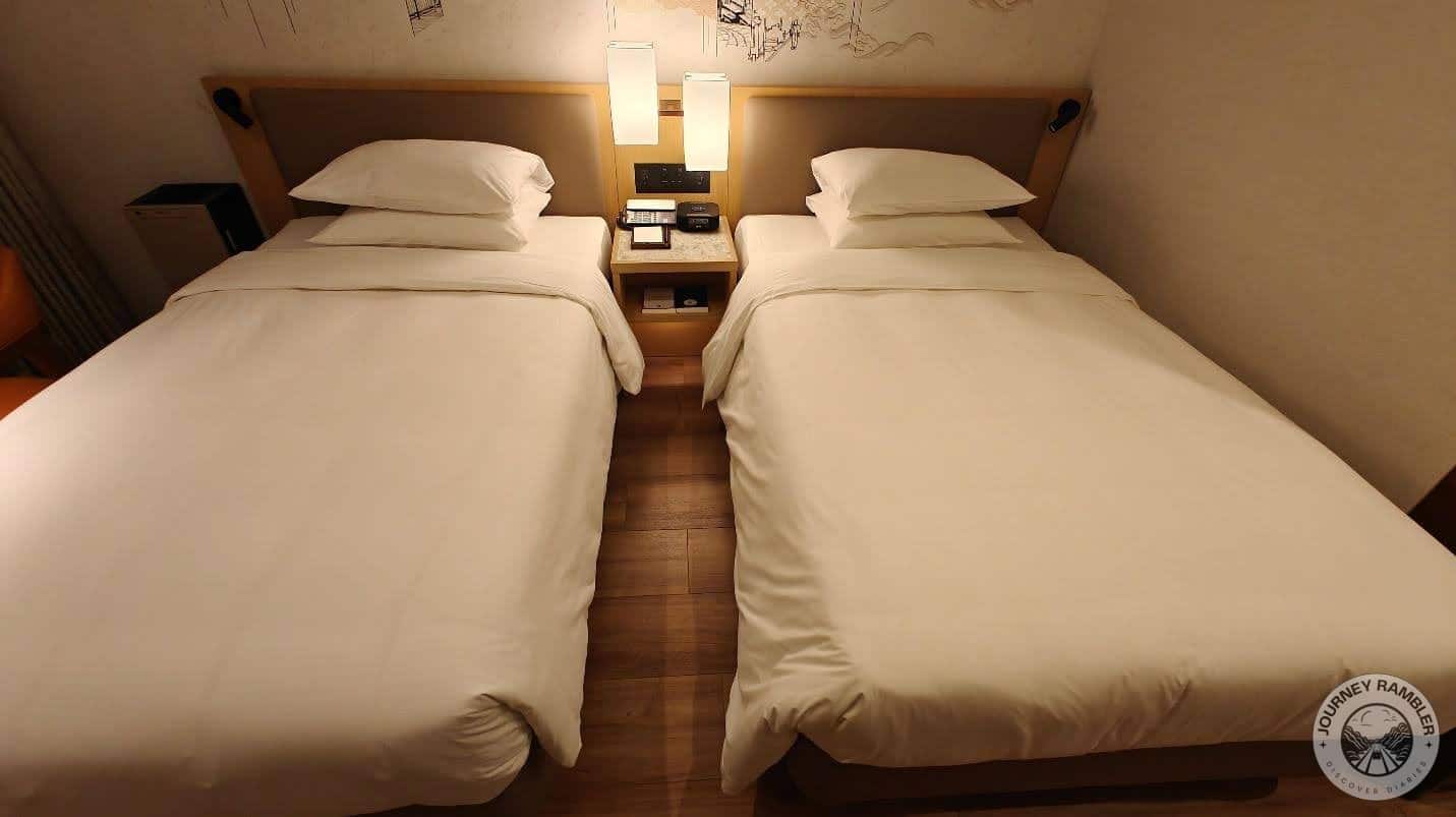 Reading lamps in between the beds