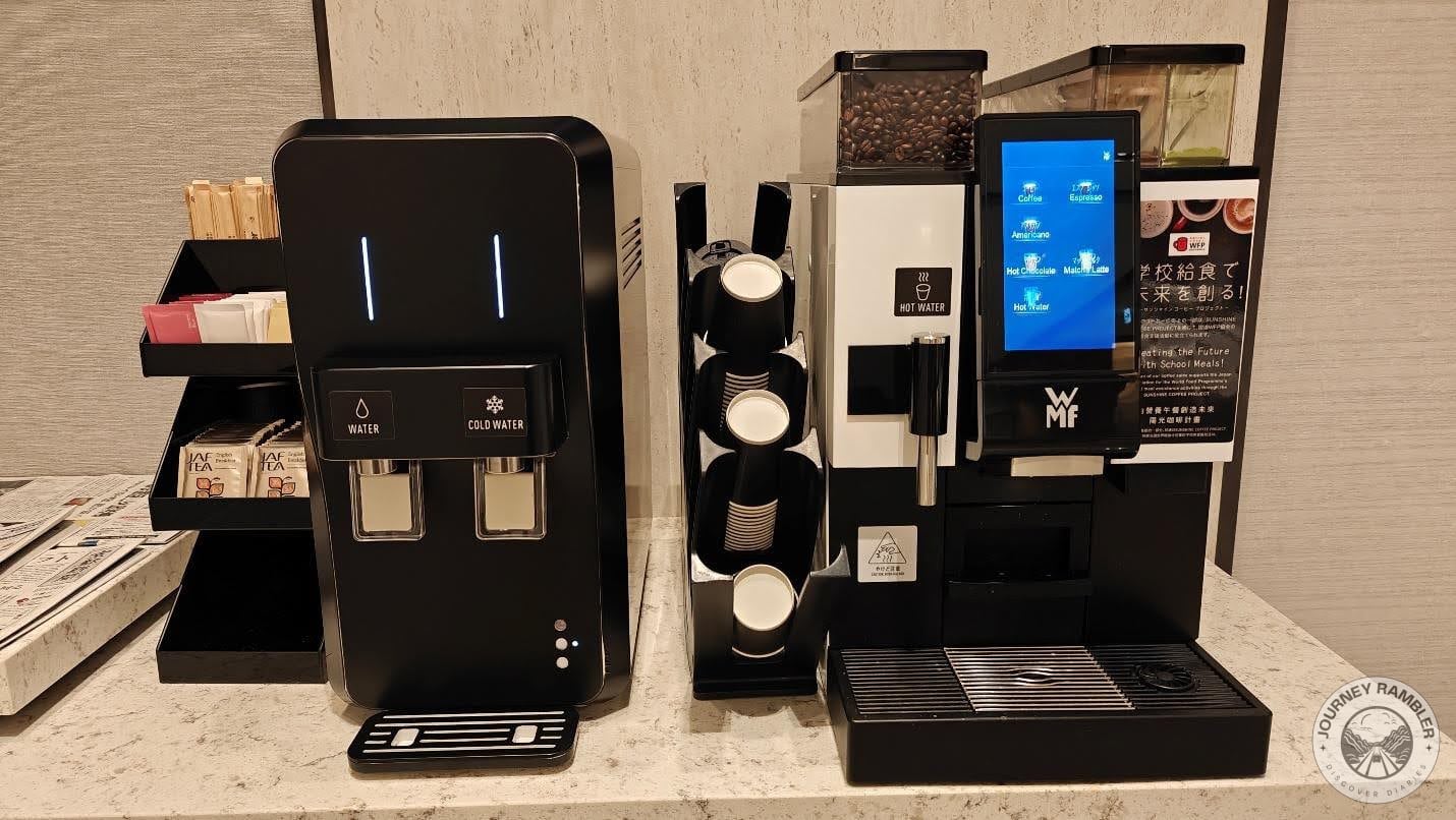 a coffee machine and a water dispenser