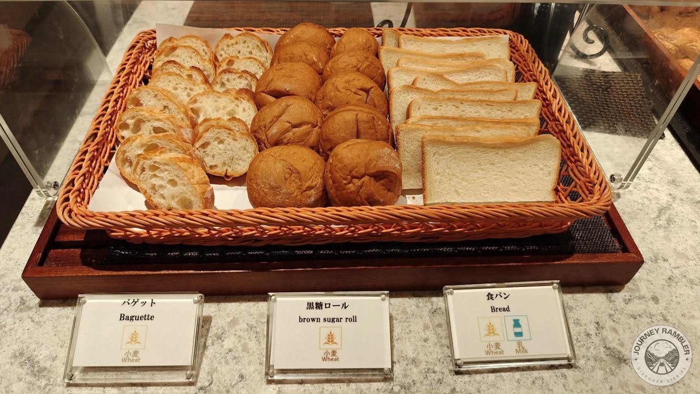 baguette, brown sugar rolls and white bread