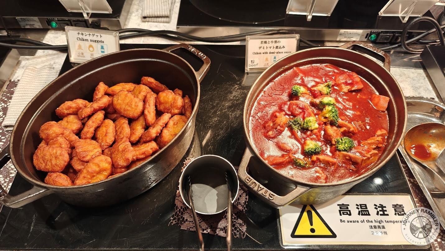 chicken nuggets and a chicken preparation in gravy