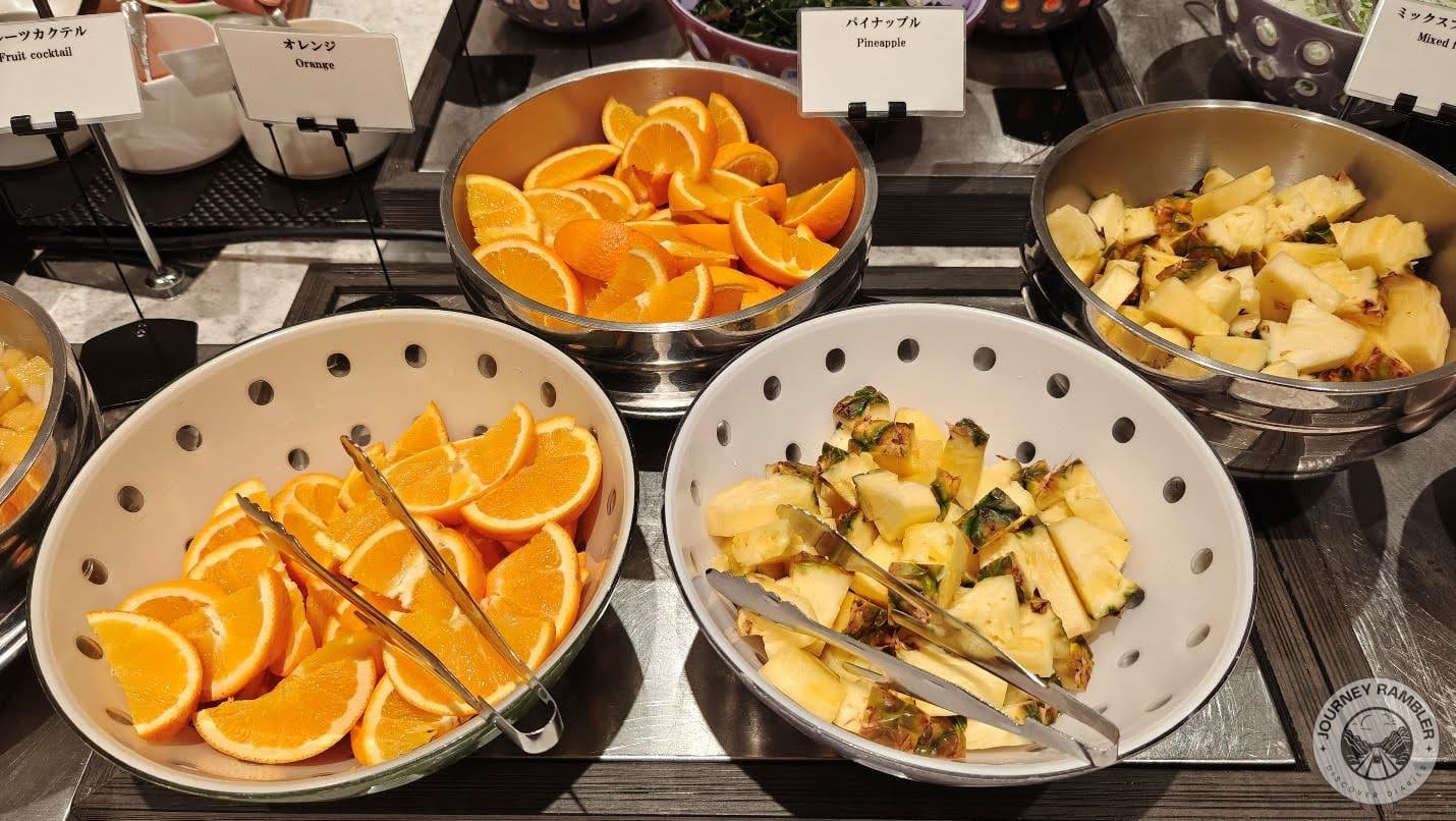 cut fruits like pineapple and orange