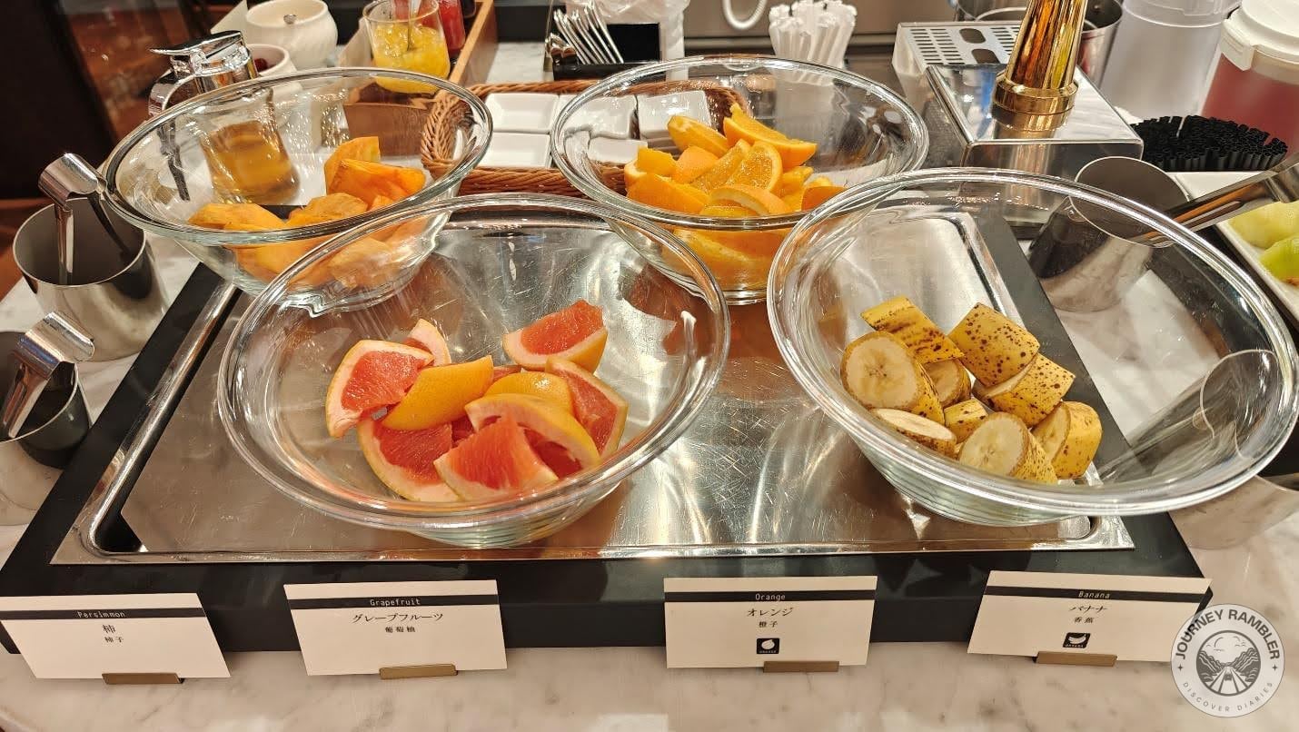 persimmon, grapefruit, oranges and bananas