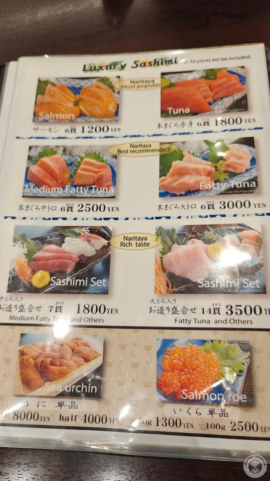 plates of sashimi and salmon roe