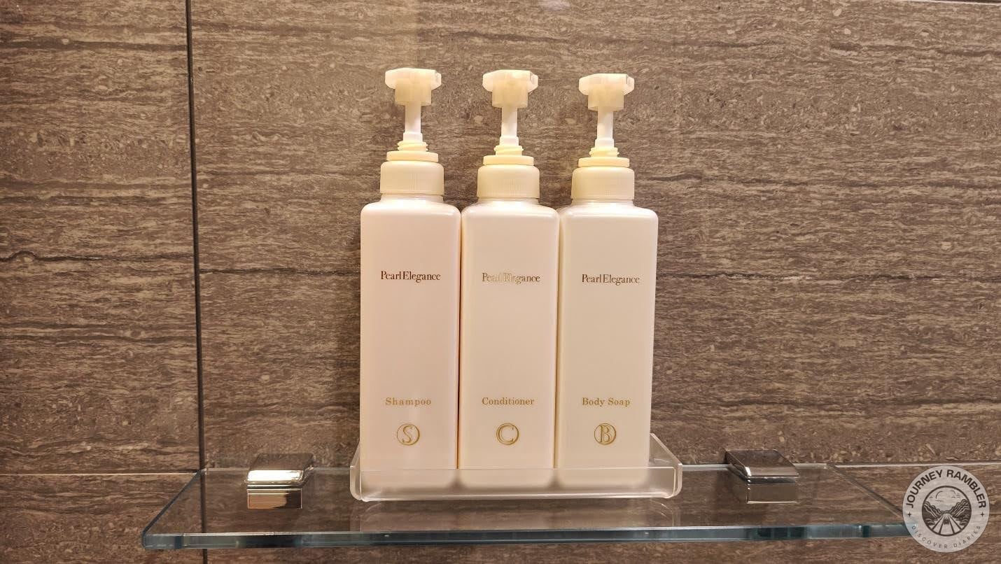 shampoo, conditioner and body soap bottles