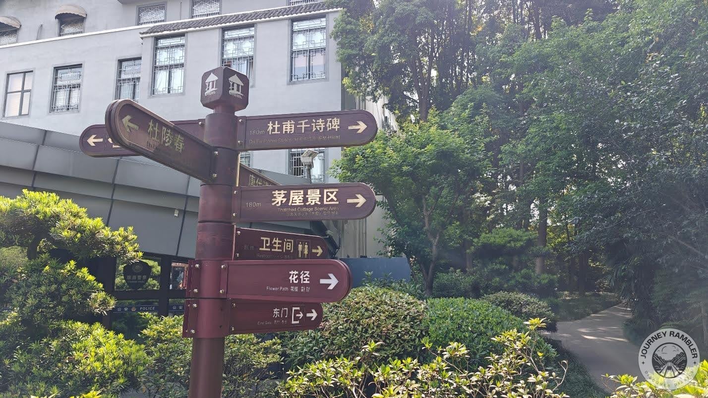 sign post which has directions to the notable attractions in this park