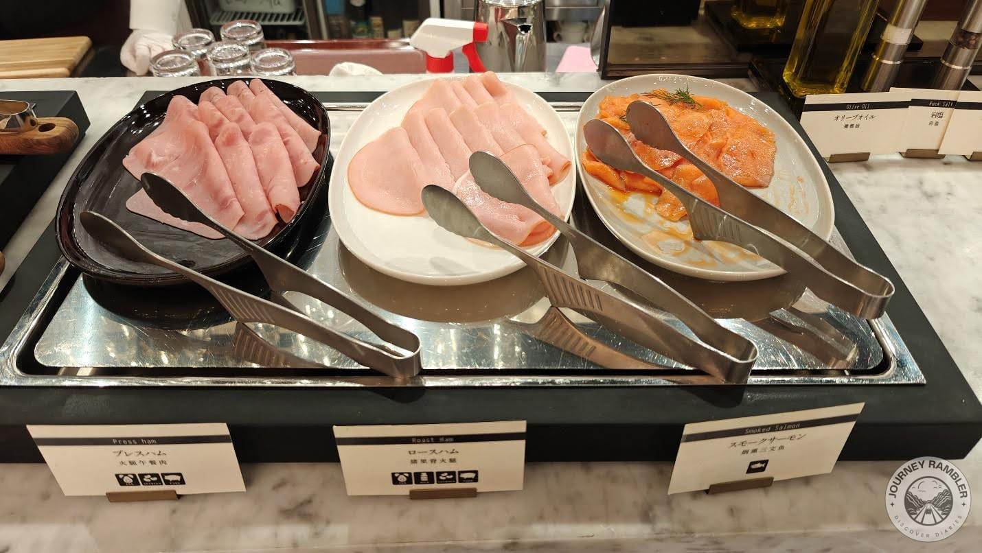 two different kinds of ham as well as smoked salmon