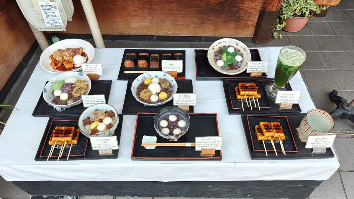 Assorted Japanese desserts and green tea on display