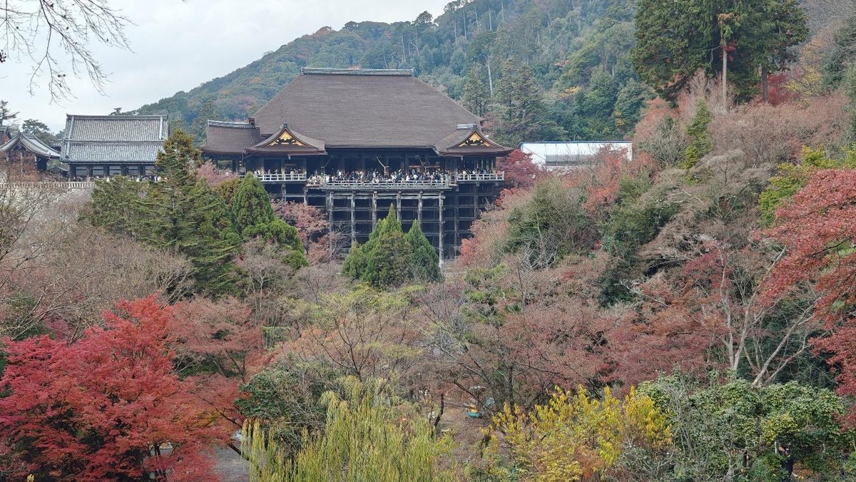 Historic temple surrounded by colorful autumn trees