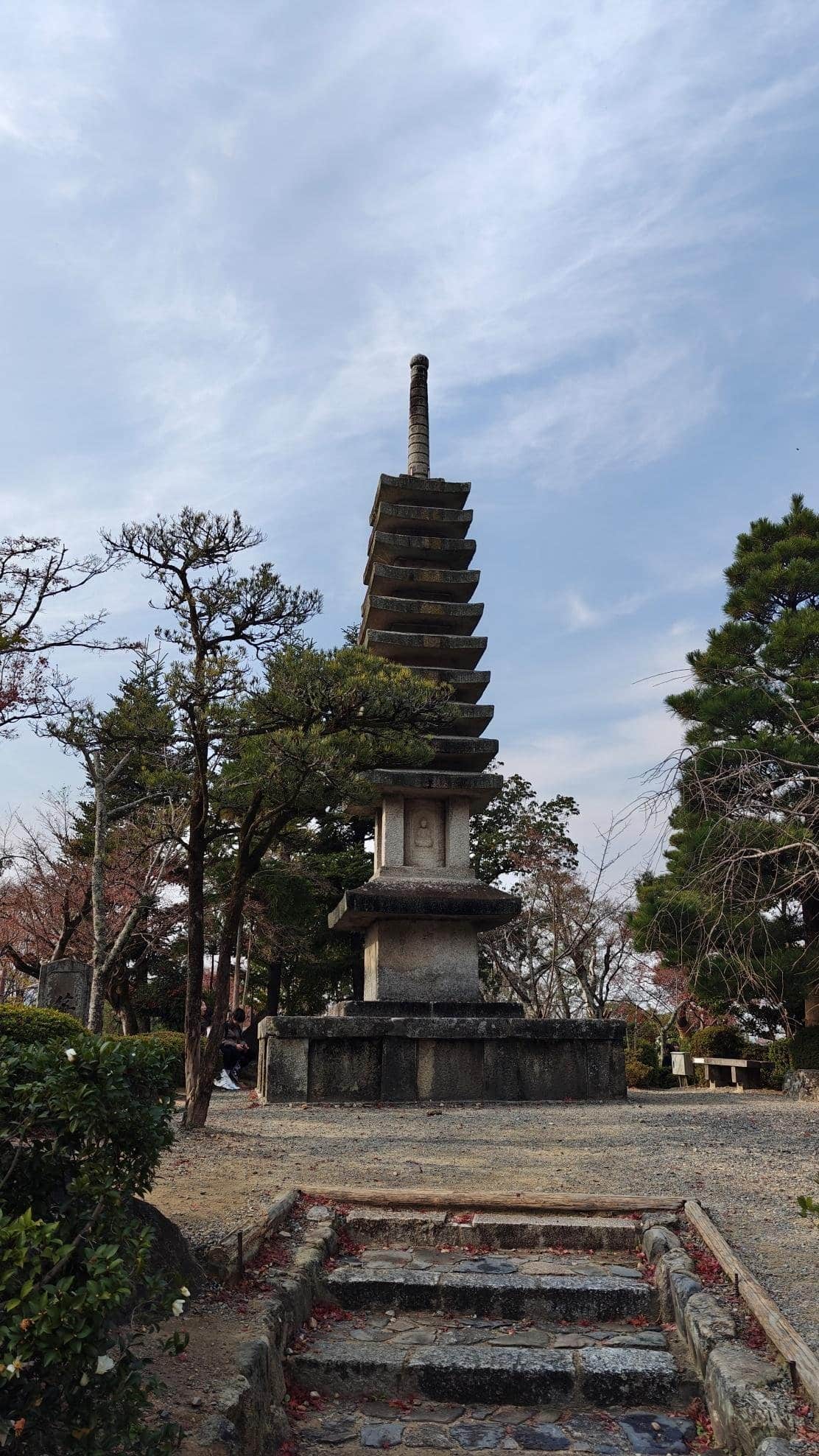 Pagoda surrounded by trees under clear sky
