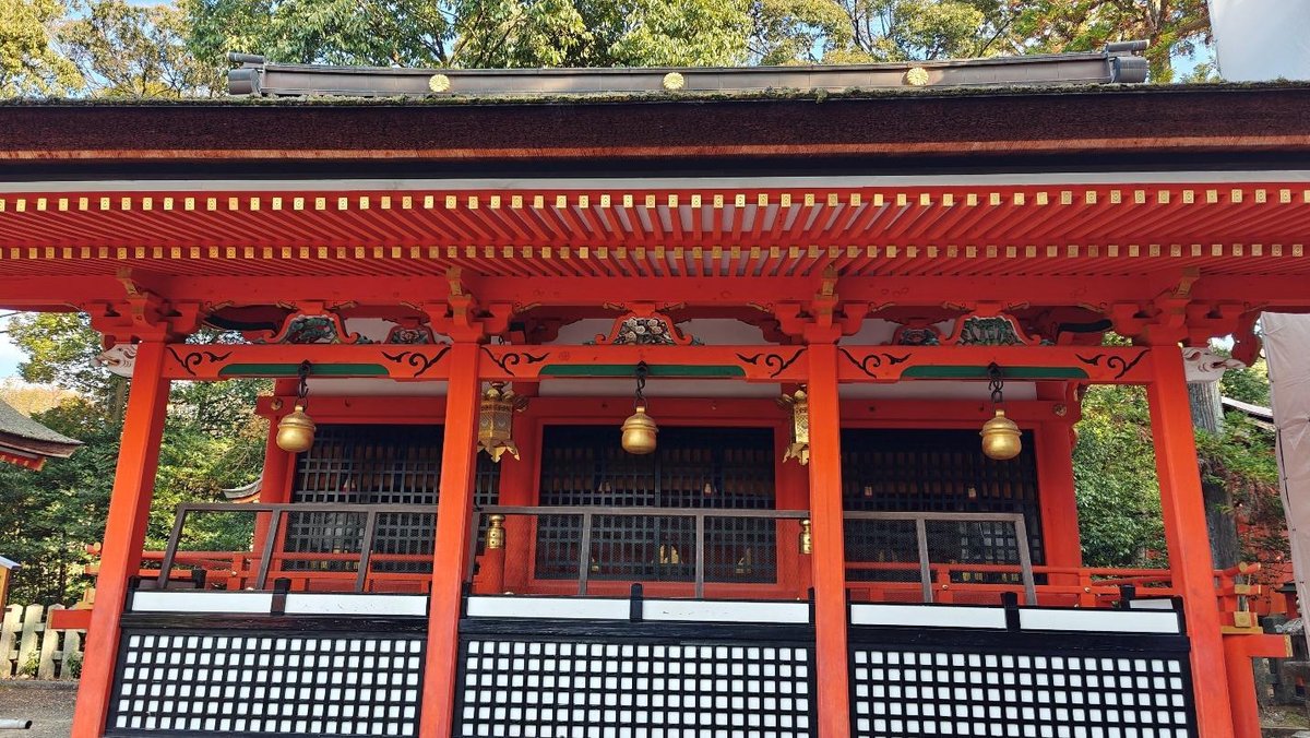 Traditional Japanese shrine with vibrant red and gold details