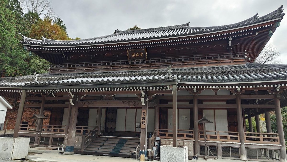 Traditional Japanese temple with ornate roof and columns