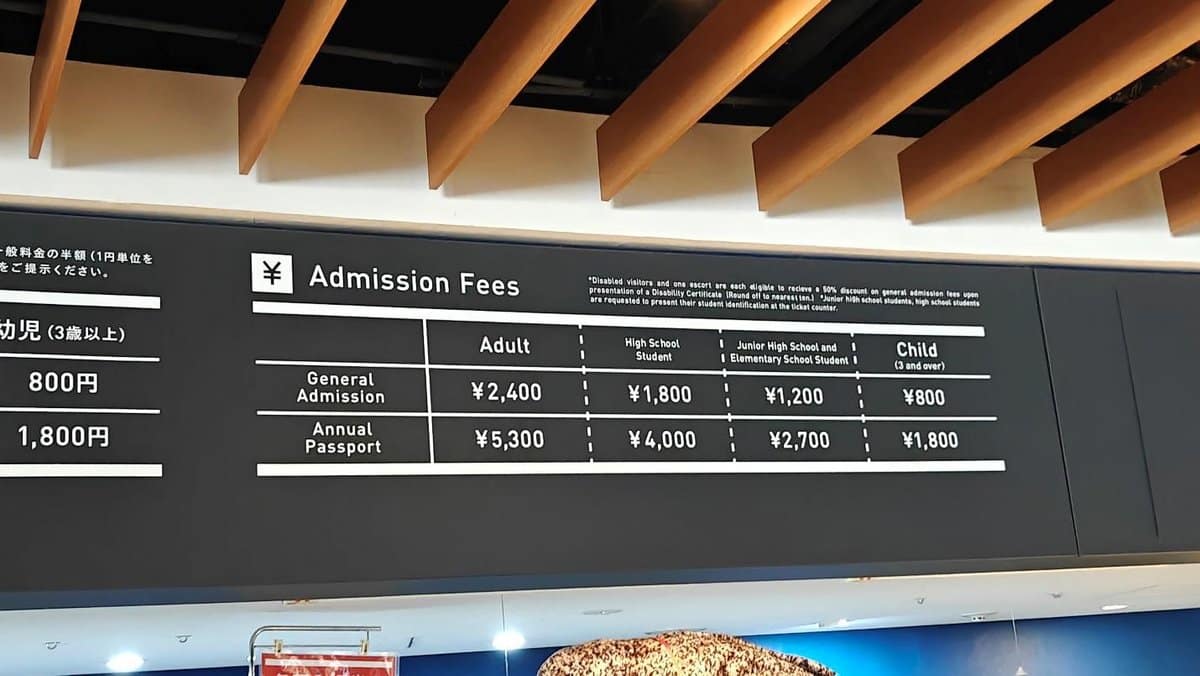 Admission fees board with pricing details in yen