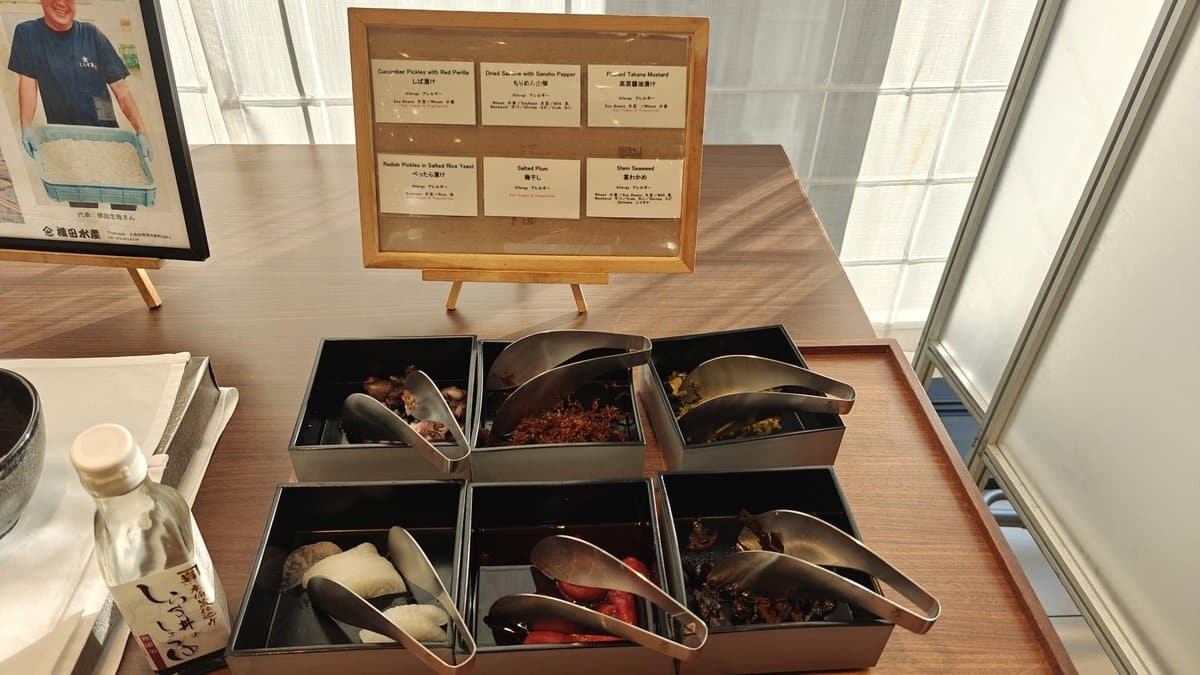 Assorted pickled condiments on table