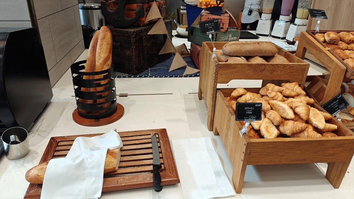 Bakery display with breads and croissants