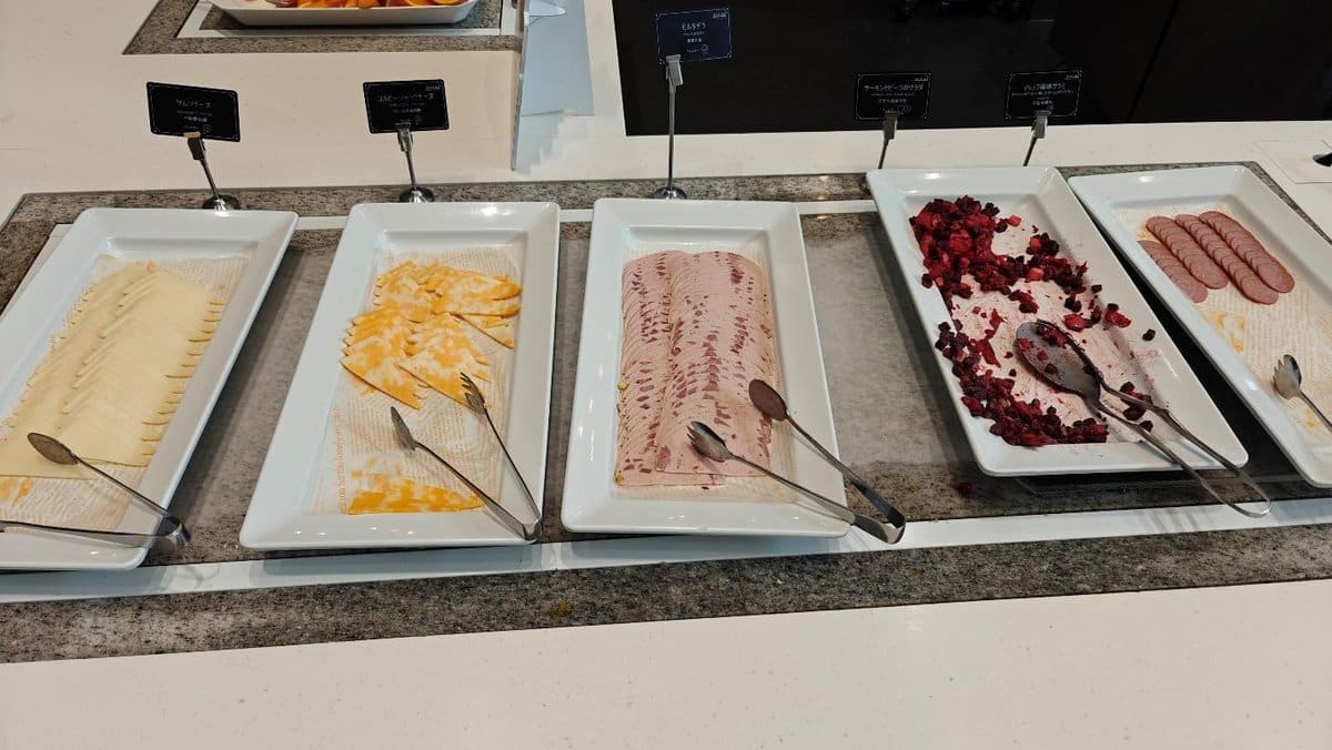 Buffet with assorted cheeses and meats