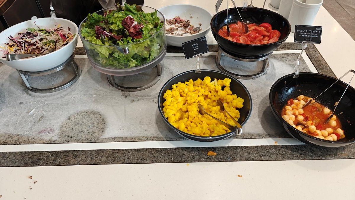 Buffet with assorted salads and dishes