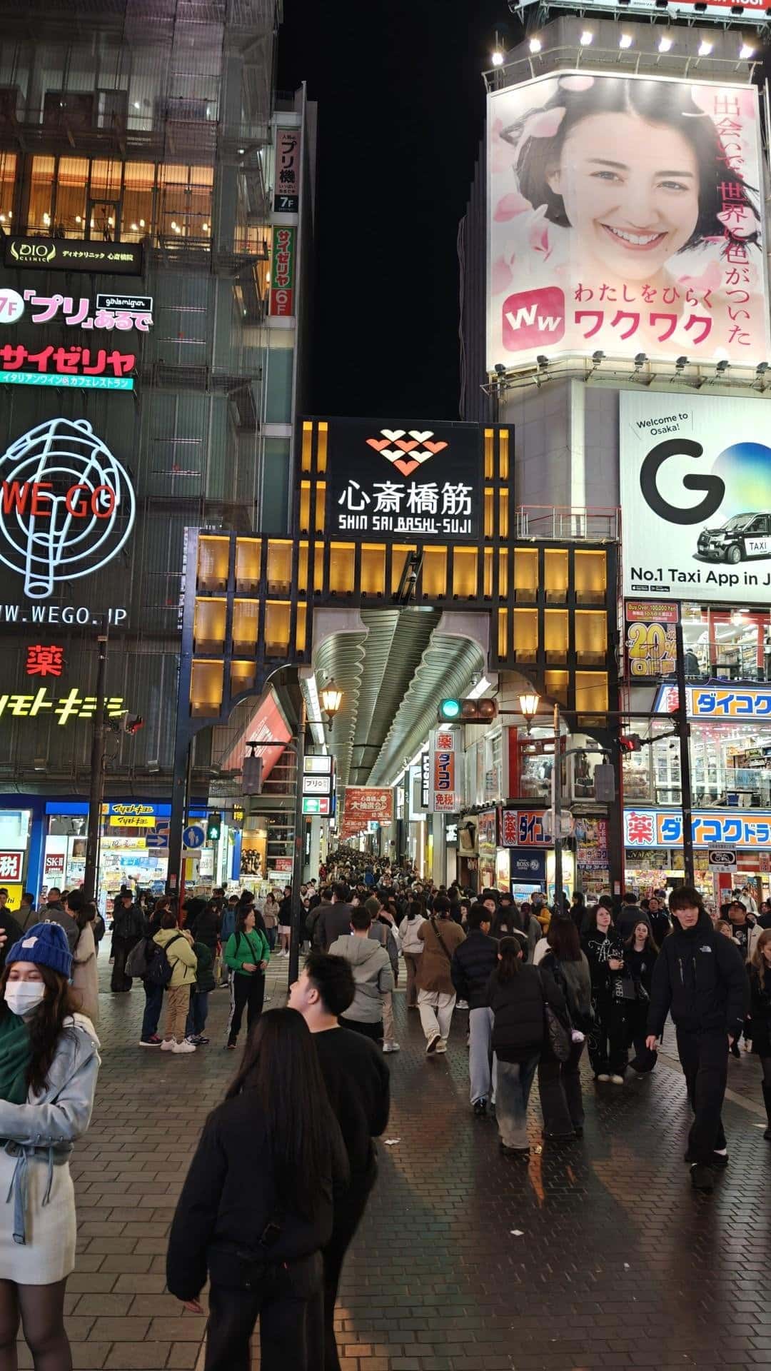 Bustling night street in Osaka