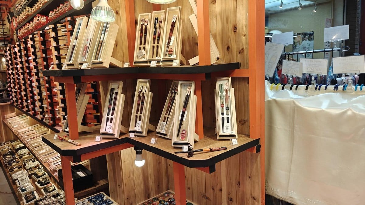 Chopsticks displayed in wooden rack