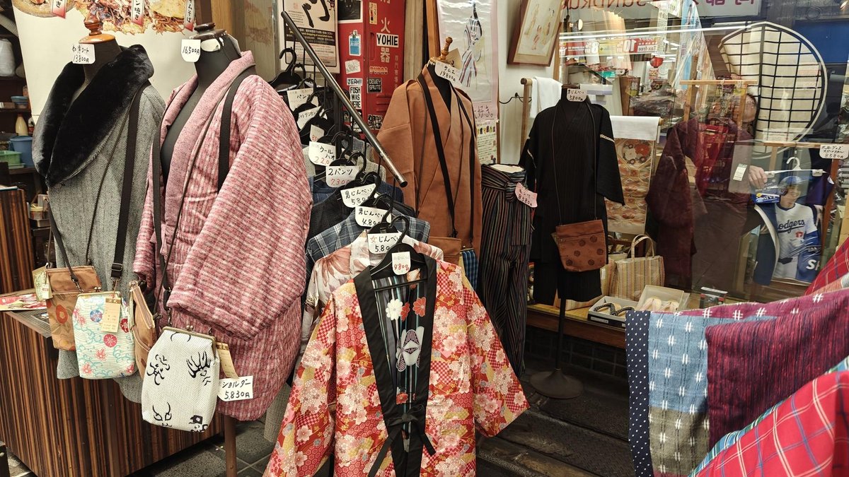 Colorful kimonos displayed in shop