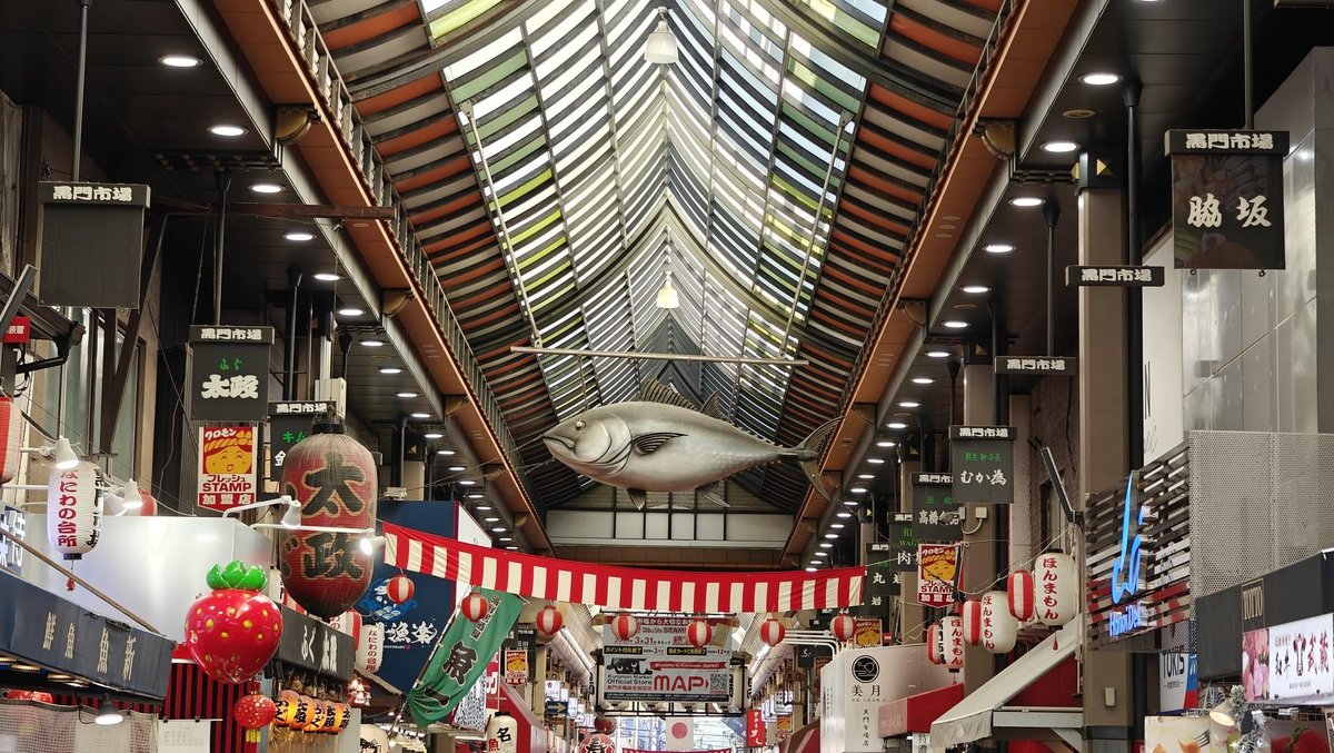 Colorful market with fish sculpture