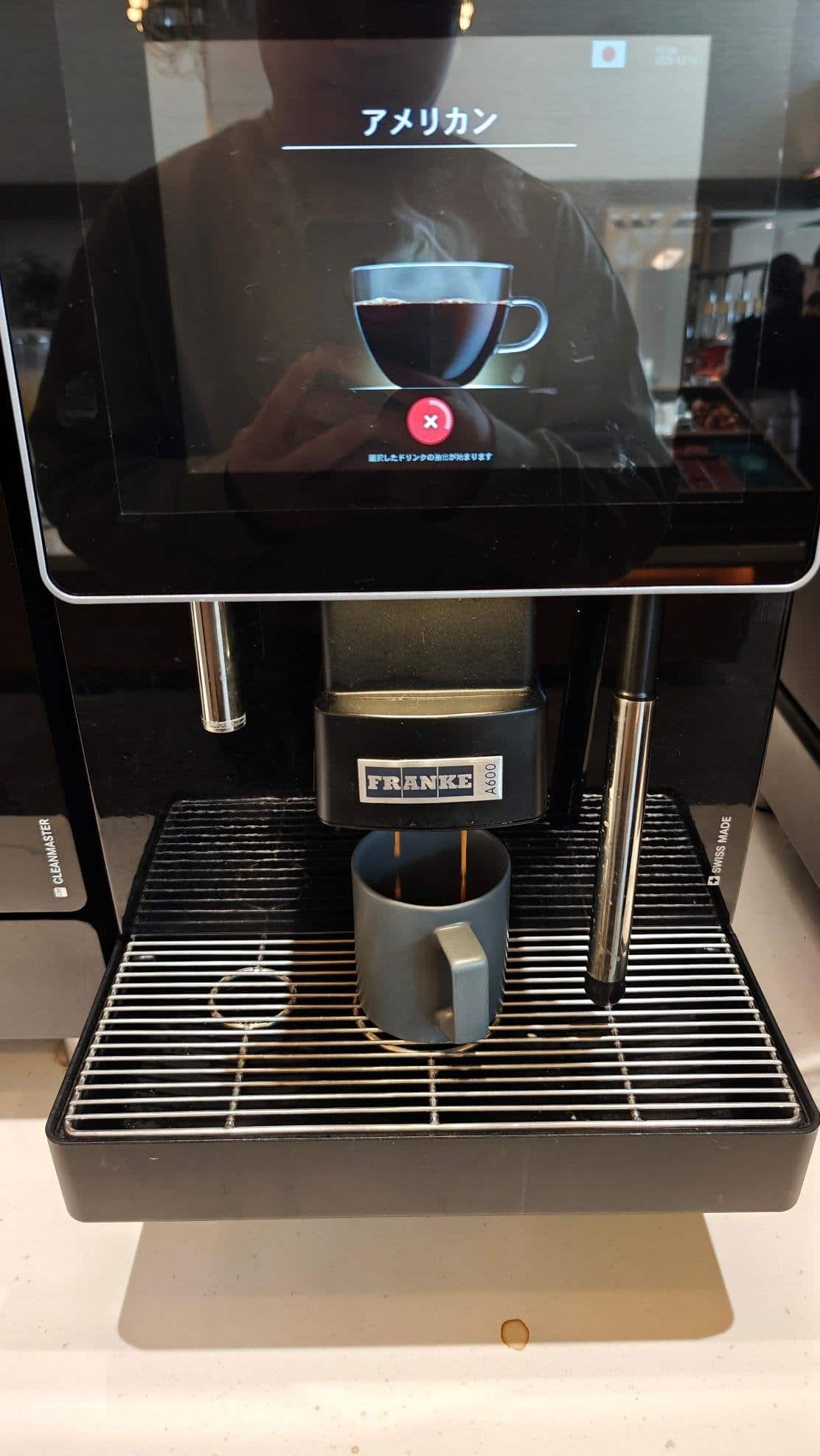 Commercial coffee maker brewing