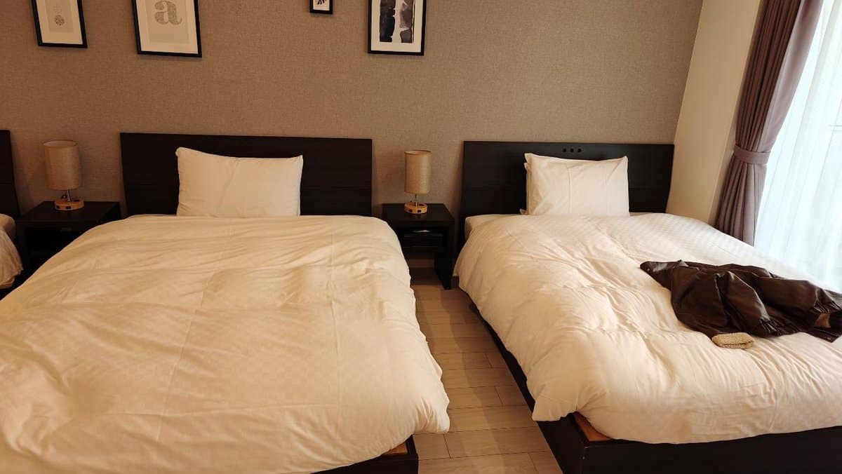 Cozy hotel room with two beds