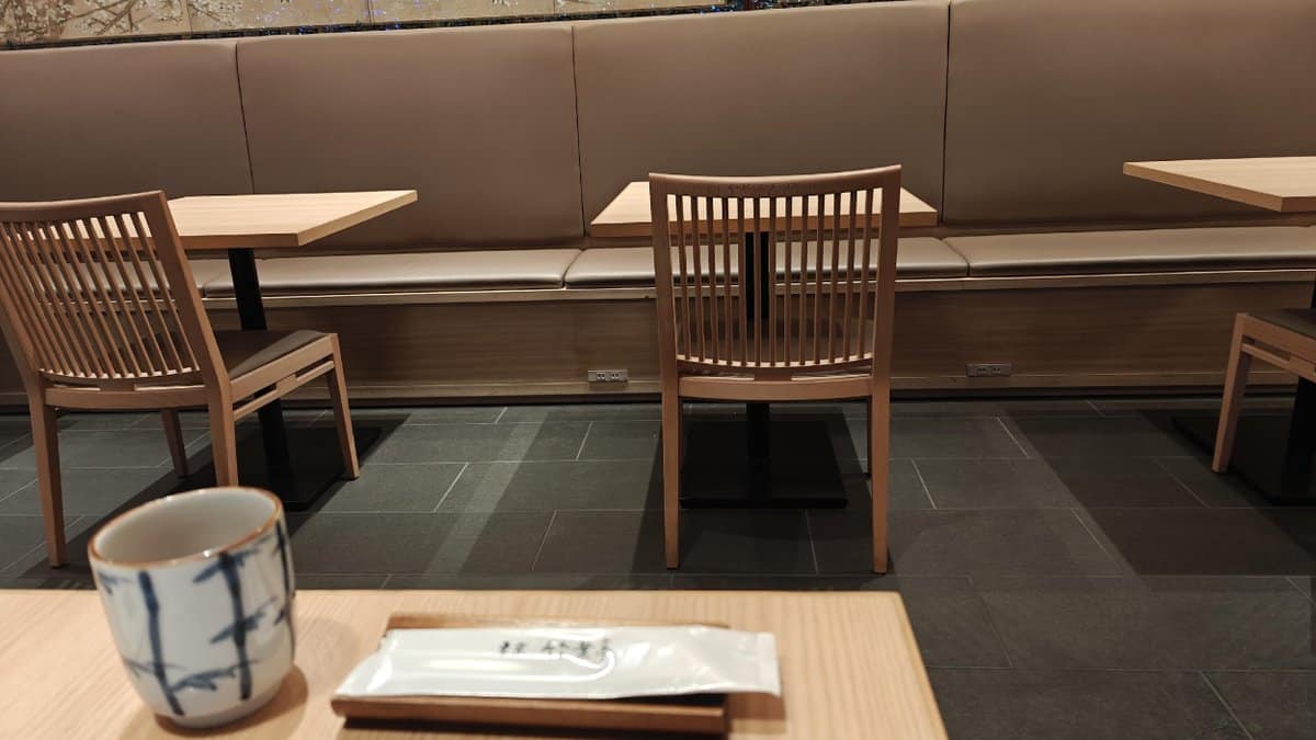 Cozy modern cafe seating with teacup