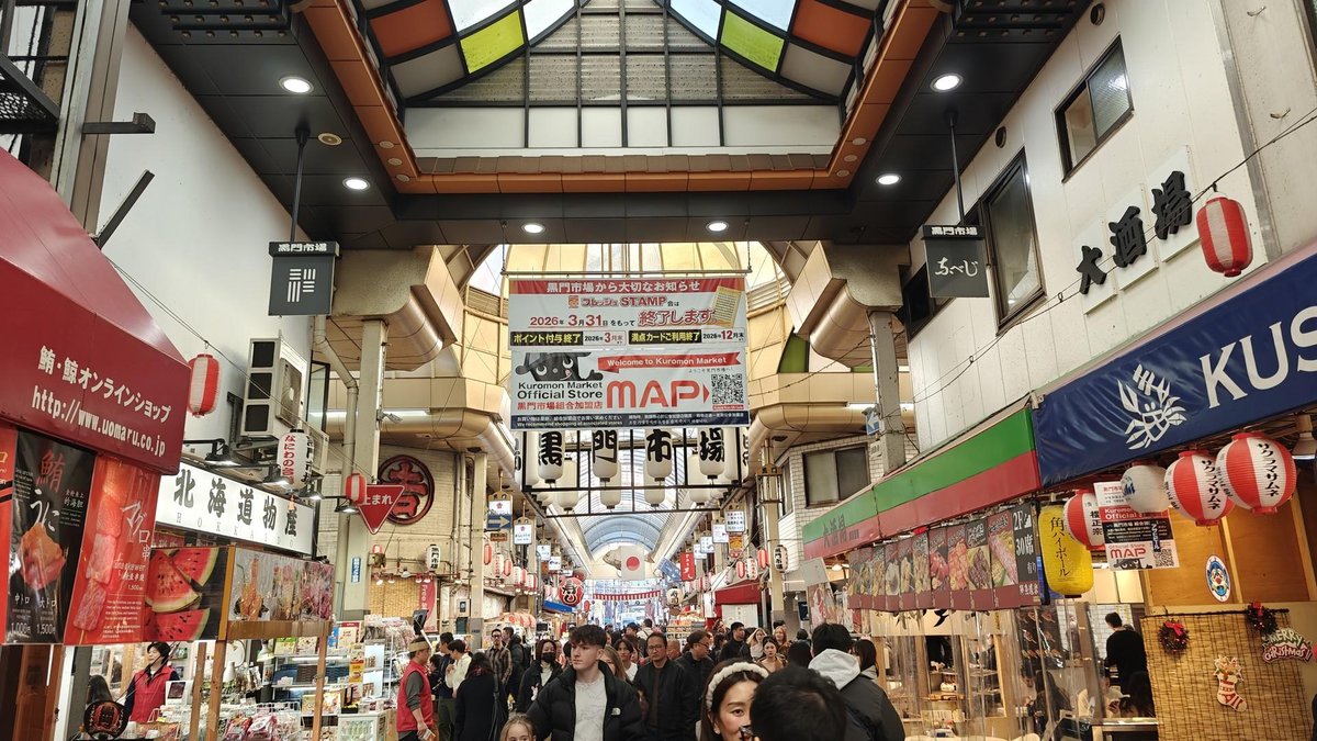 Crowded indoor market street scene