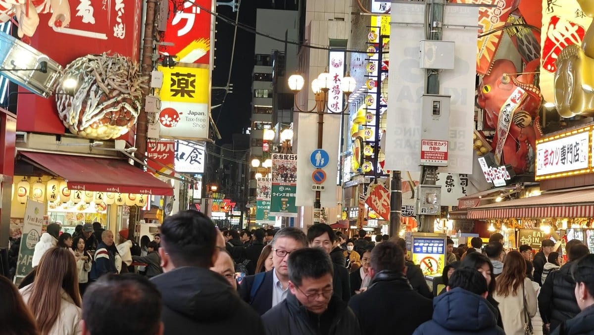 Crowded Japanese street at night