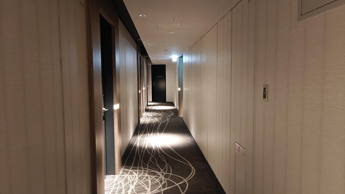 Dimly lit hotel hallway