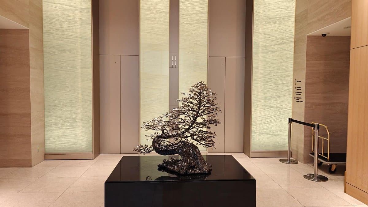 Elegant bonsai sculpture in lobby