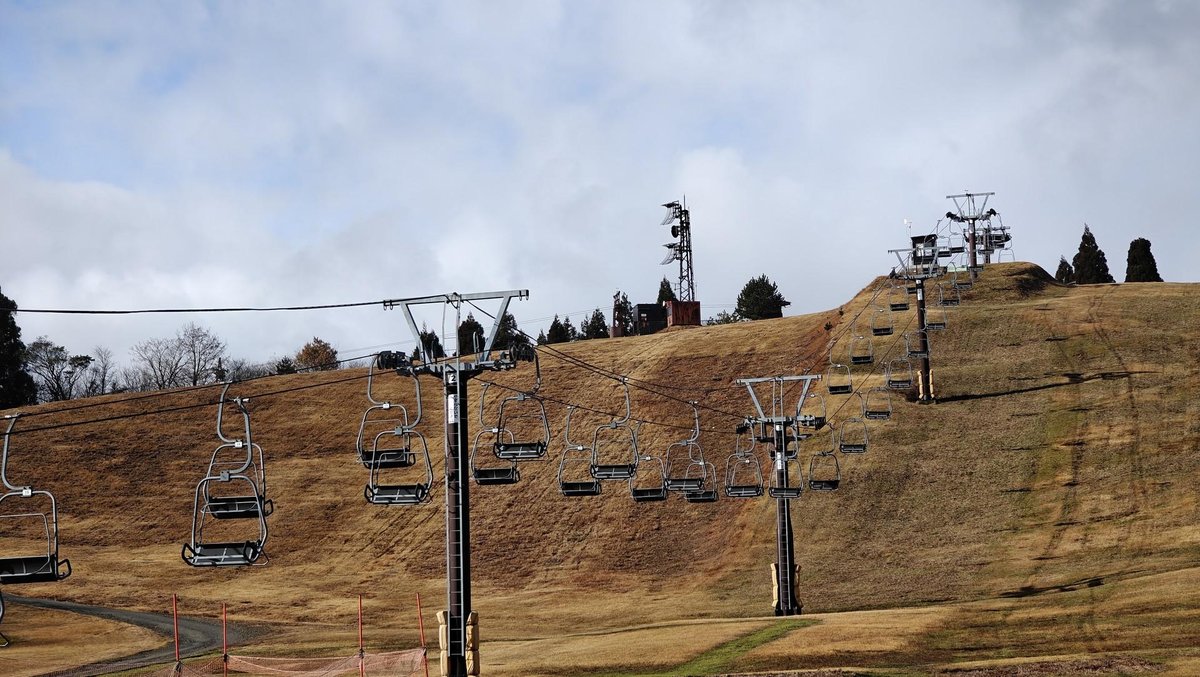 Empty ski lift on dry hillside