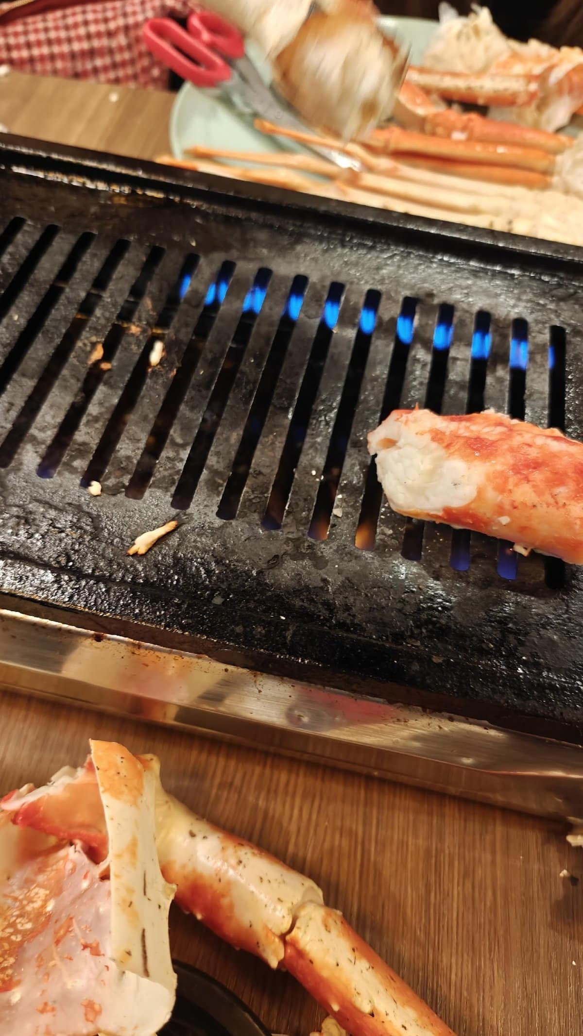 Grilling crab legs on barbecue grill