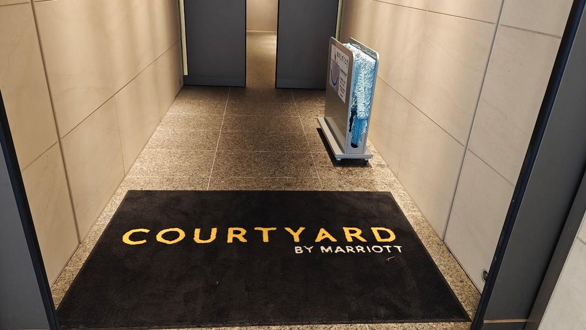 Hotel lobby entrance with floor mat