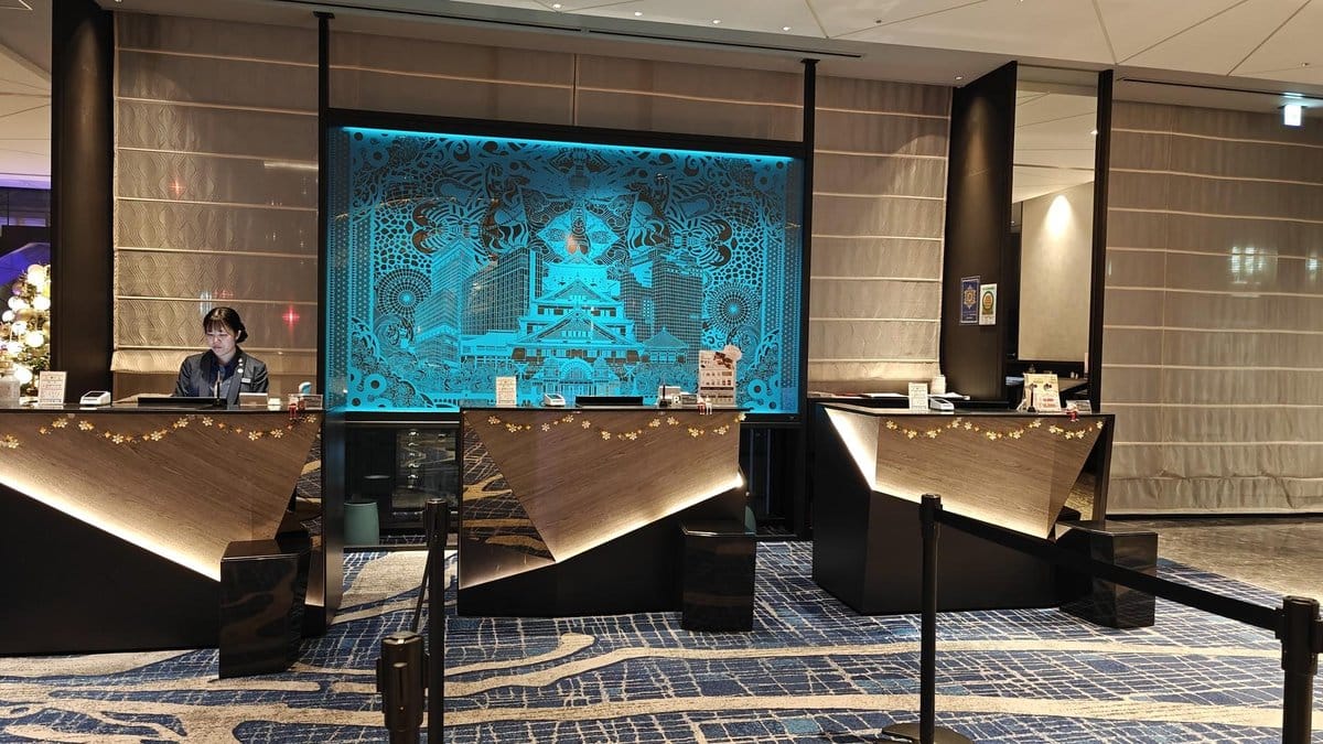 Hotel reception with decorative panel