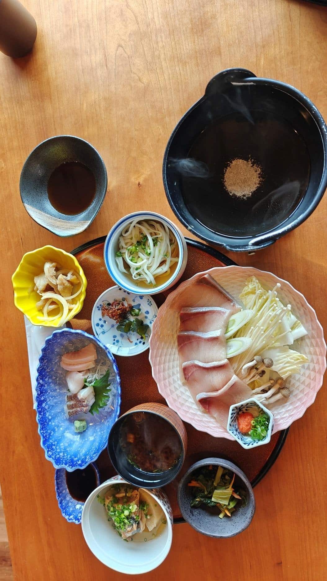 Japanese meal with sashimi and udon