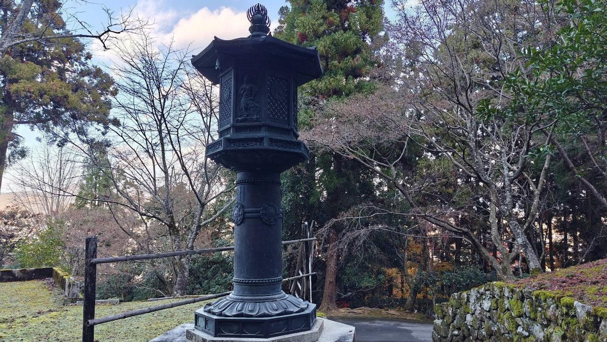 Japanese stone lantern in serene wooded area