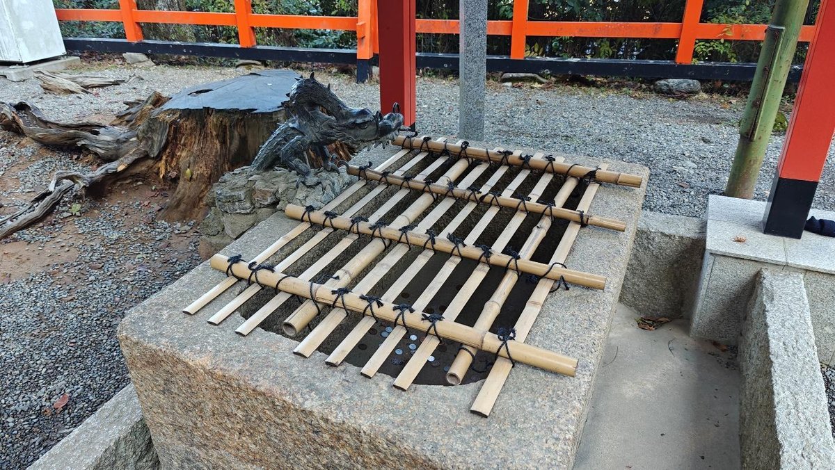 Japanese water basin with dragon sculpture