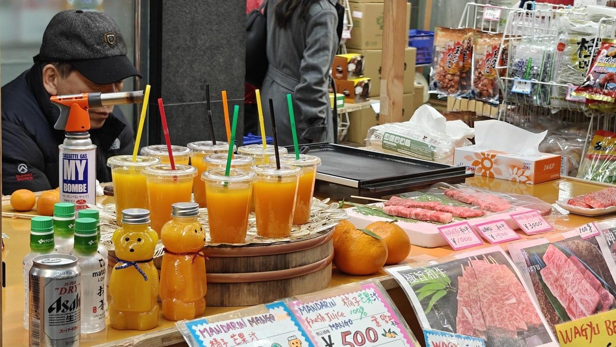 Juice stall with fresh drinks and wagyu beef