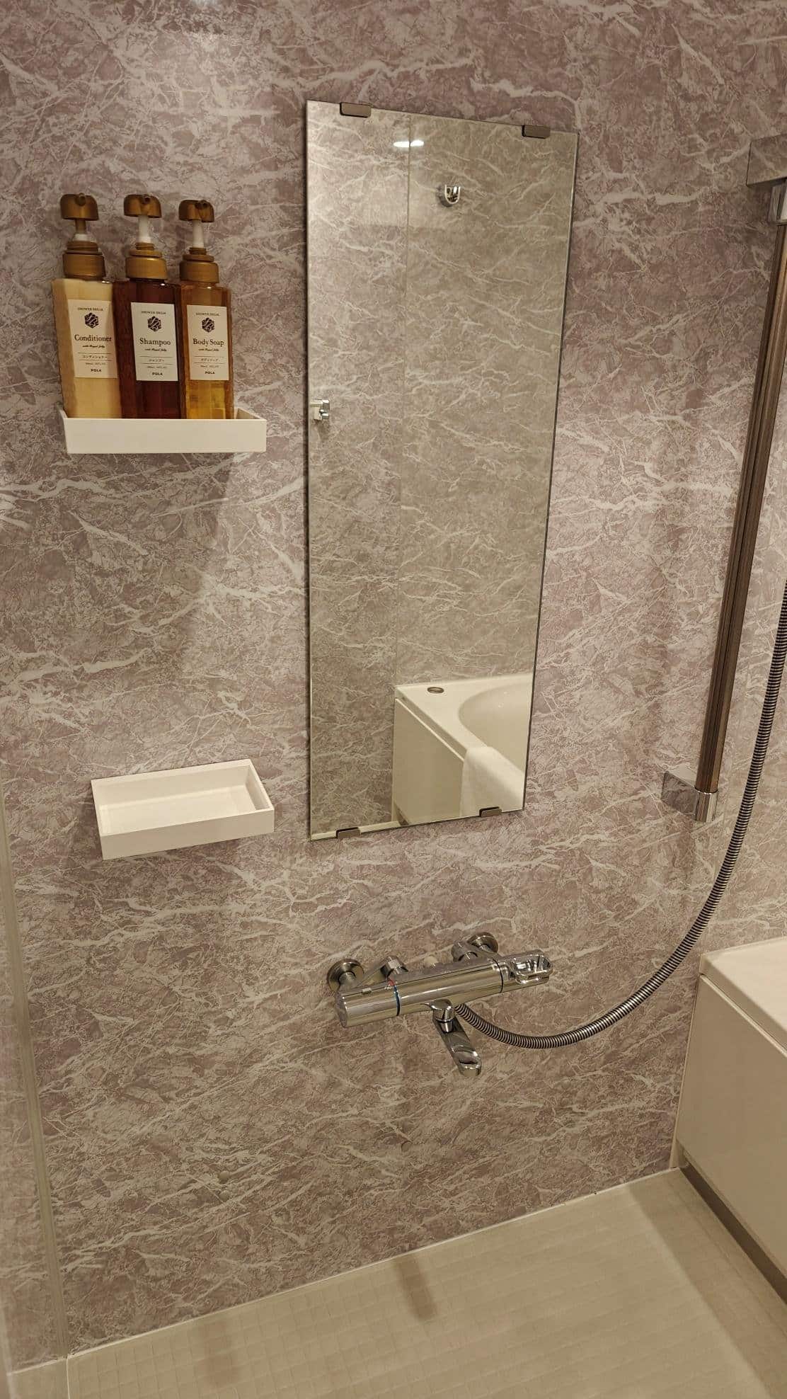 Marble bathroom with toiletries