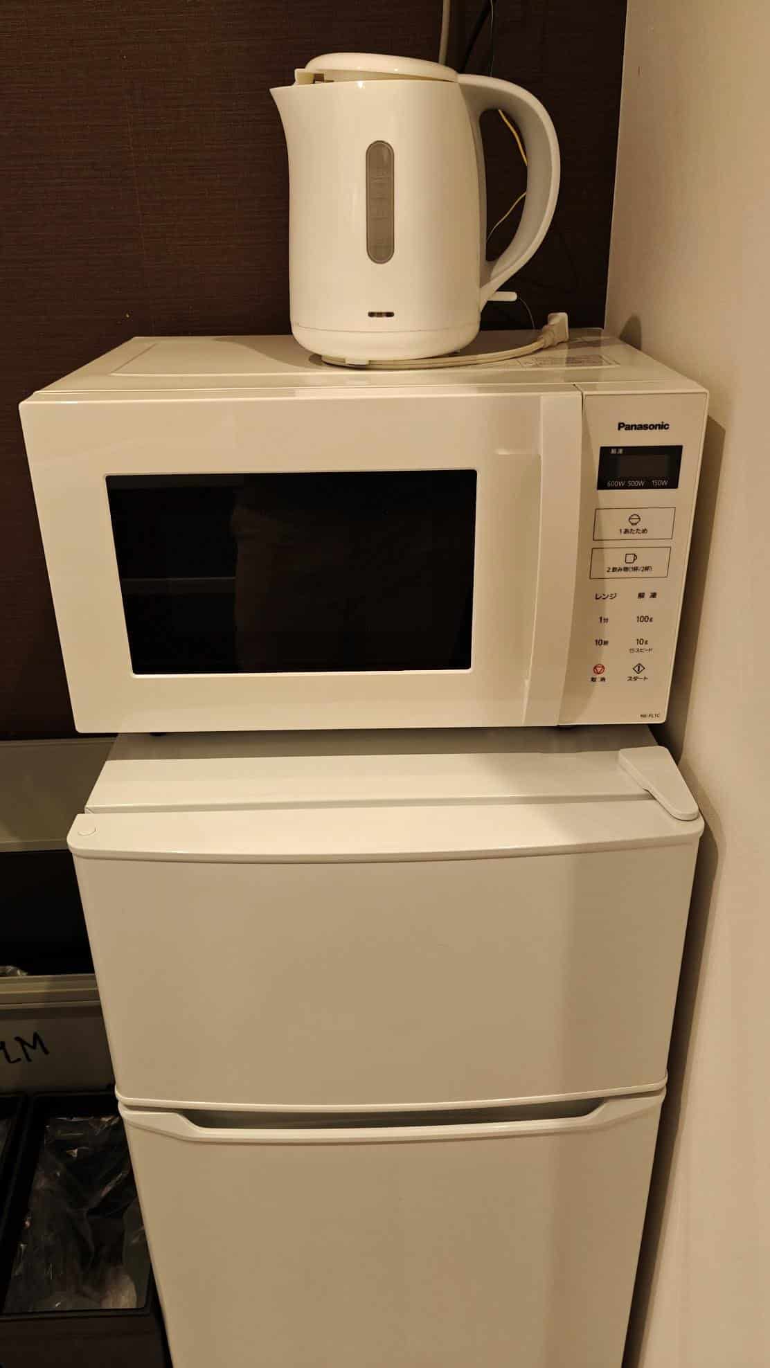 Microwave with kettle on top