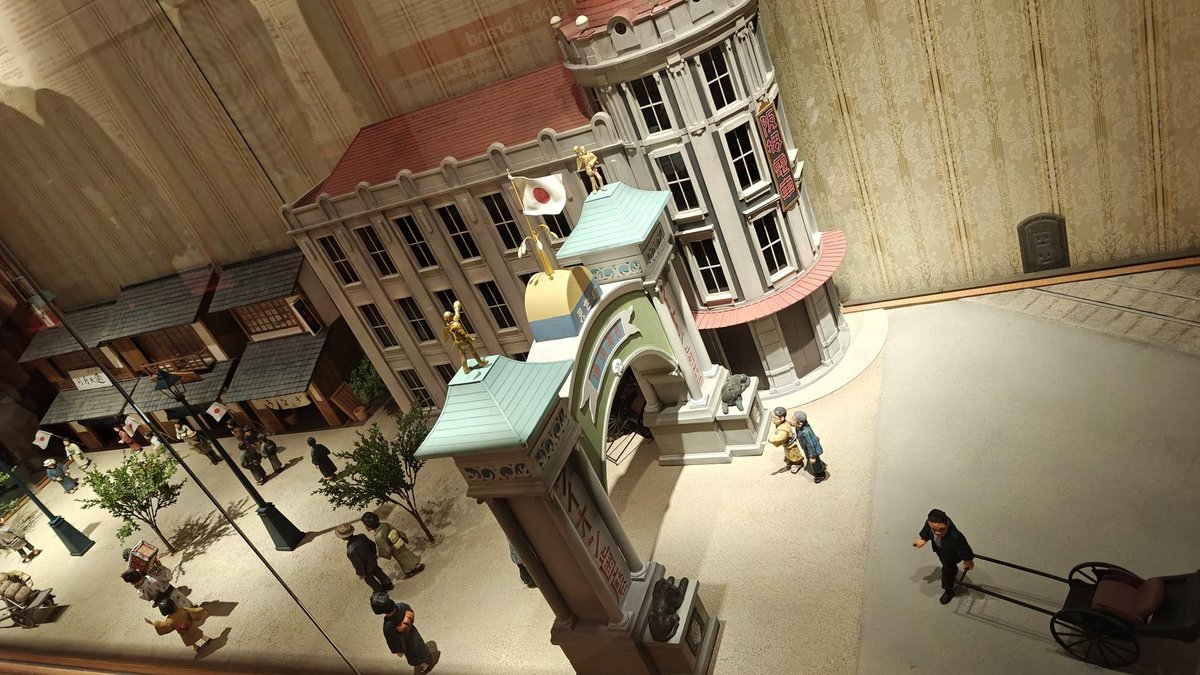 Miniature cityscape with people and buildings