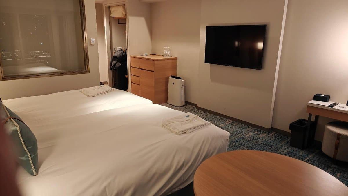 Modern hotel room with two beds