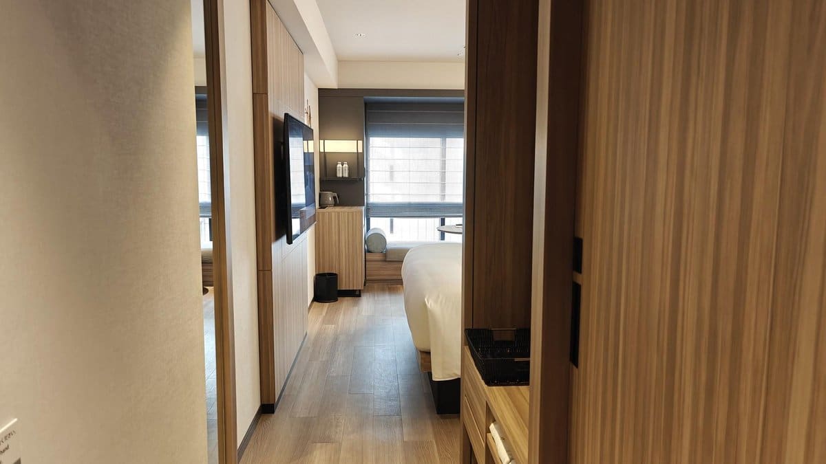 Modern hotel room with wooden decor