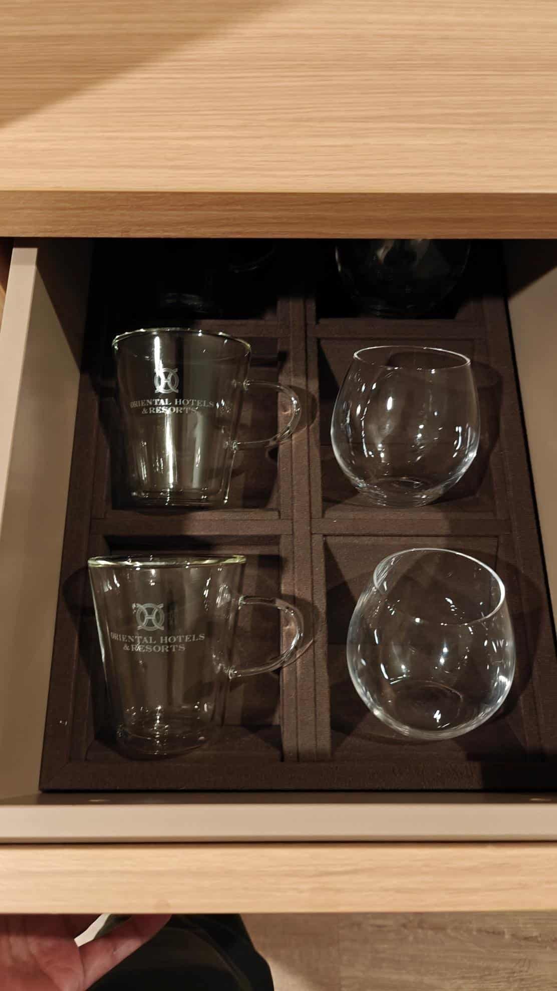 Open drawer with glassware set