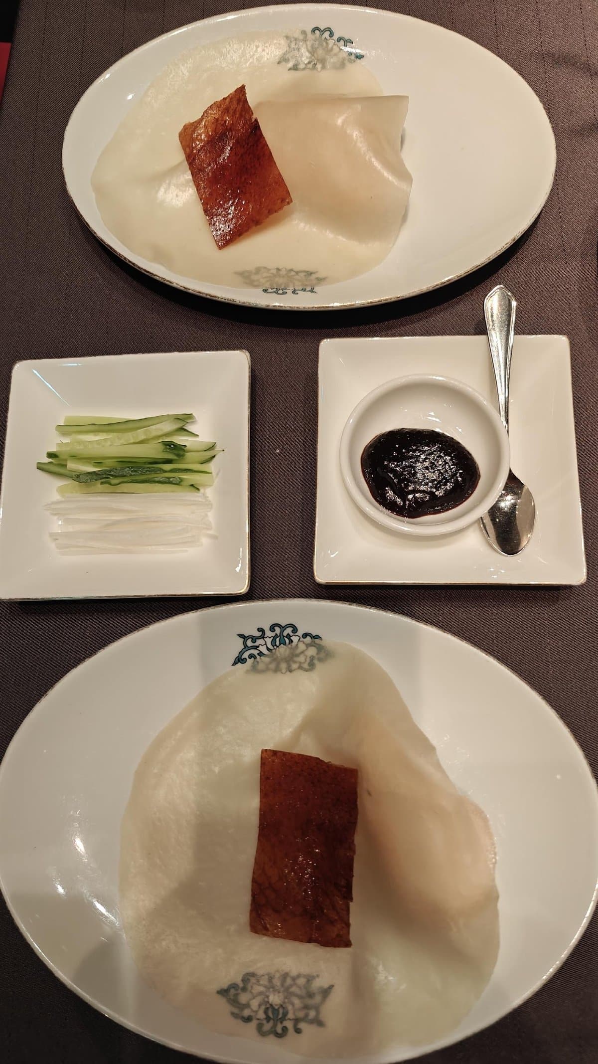 Peking duck wraps with sauce and cucumbers