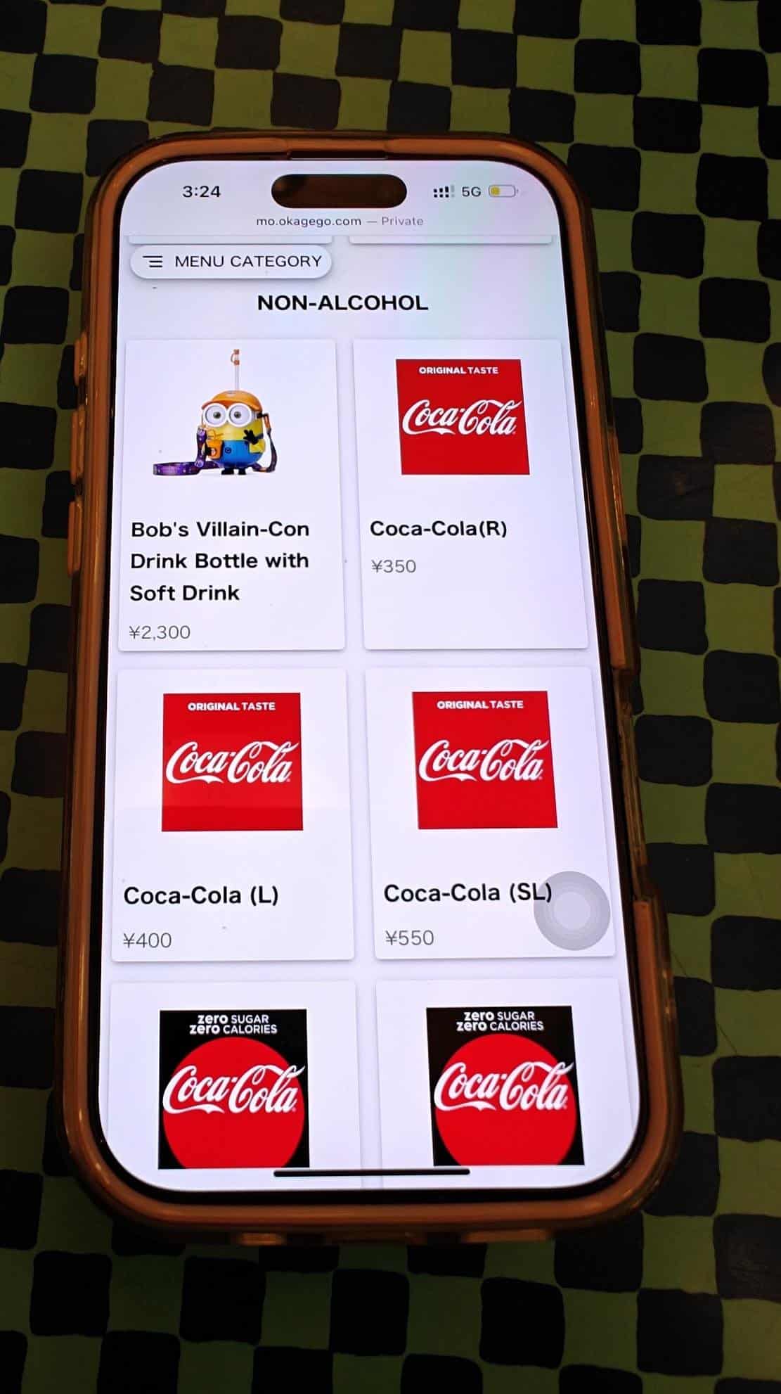 Phone showing drink menu screen
