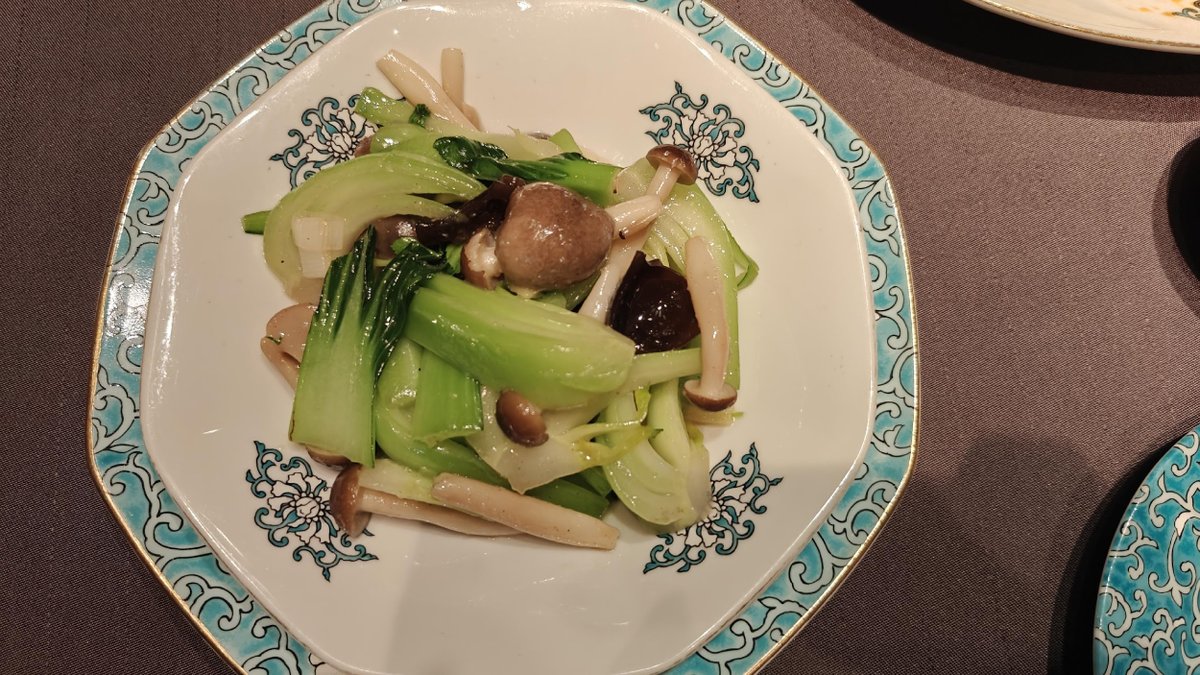Plate of stir-fried vegetables and mushrooms