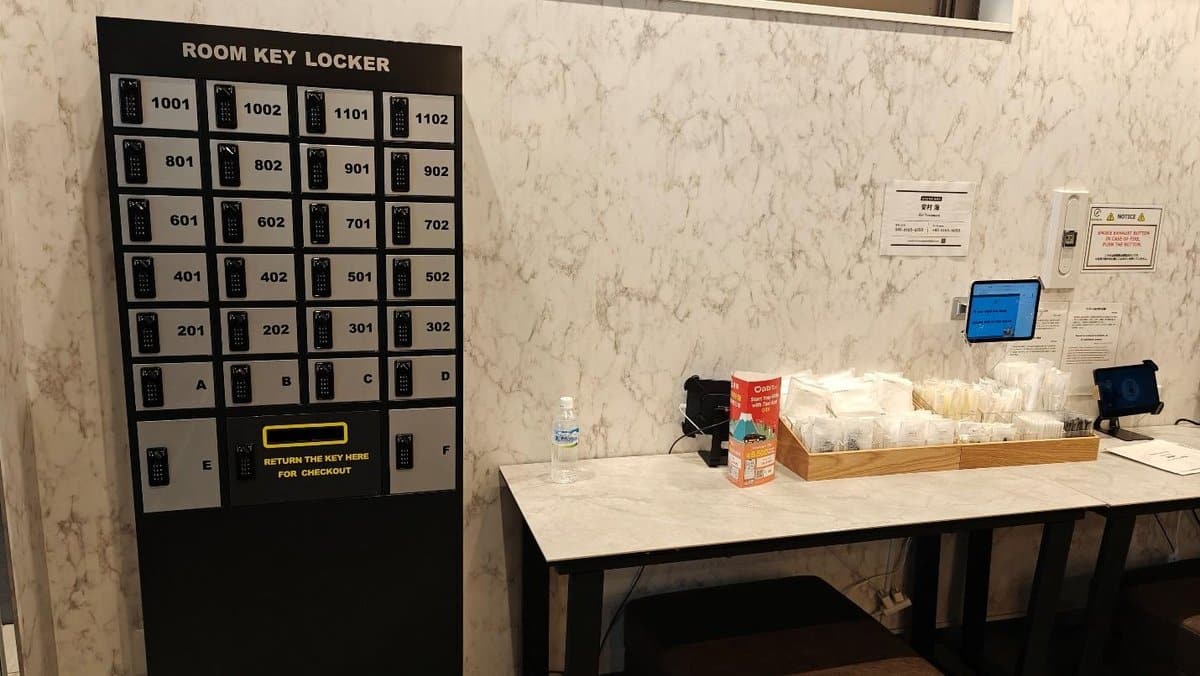 Room key locker and welcome station