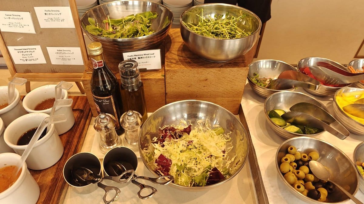 Salad bar with dressings and toppings